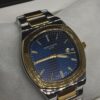 MEN'S PTK PHPE NEW NAUTILIUS DATE ADJUST TWO TONE CHAIN WITH BLUE DIAL