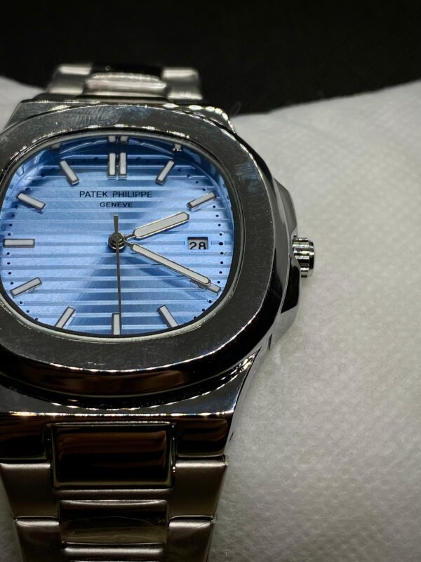 PTK PHPE NAUTILIUS DATE ADJUST SILVER CHAIN WITH LIGHT BLUE DIAL