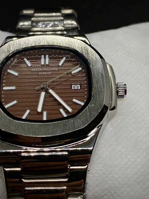 PTK PHPE NAUTILIUS DATE ADJUST SILVER CHAIN WITH BROWN DIAL